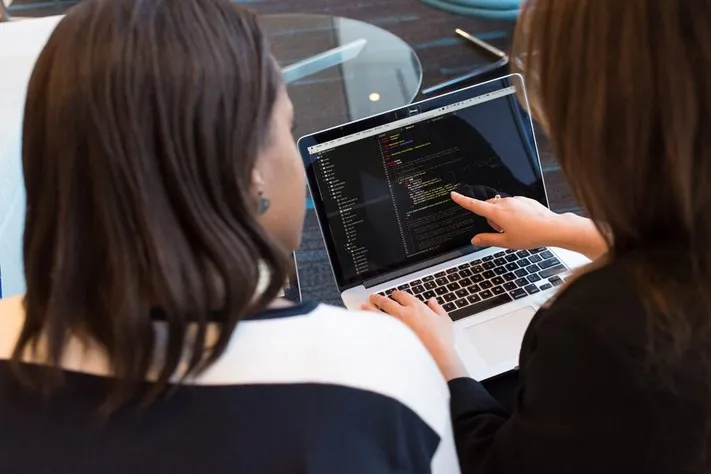 Software Developer Coding in her Laptop