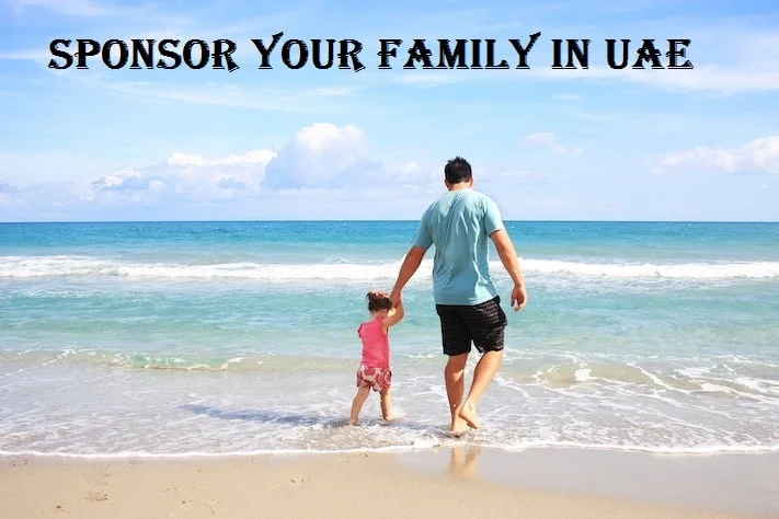 daughter with her father enjoying on beach in dubai